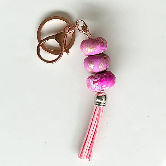 Keyring ~ Pink Polymer Clay.

Handmade Beads with Rose Gold Coloured key chain.

The perfect stocking filler for Christmas.
